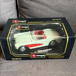 1957 BBURAGO CHEVROLET CORVETTE 1/18 SCALE DIECAST DIAMONDS WHITE AND RED--NEW